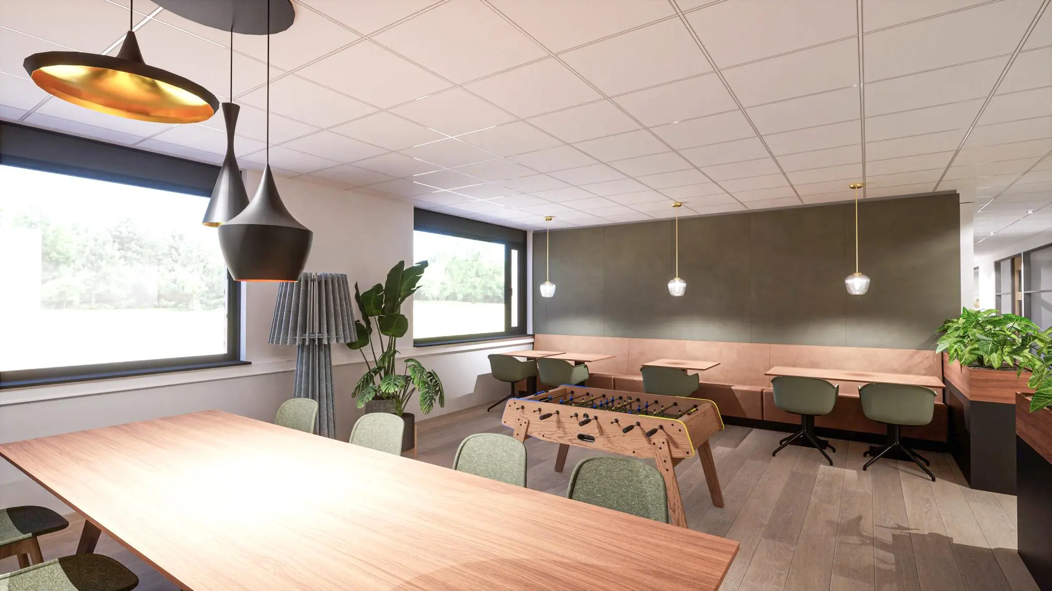 Moderne en sfeervolle kantineruimte in het gemeentehuis aan de Burgemeester Verderlaan, met zithoeken, tafelvoetbaltafel en hanglampen.